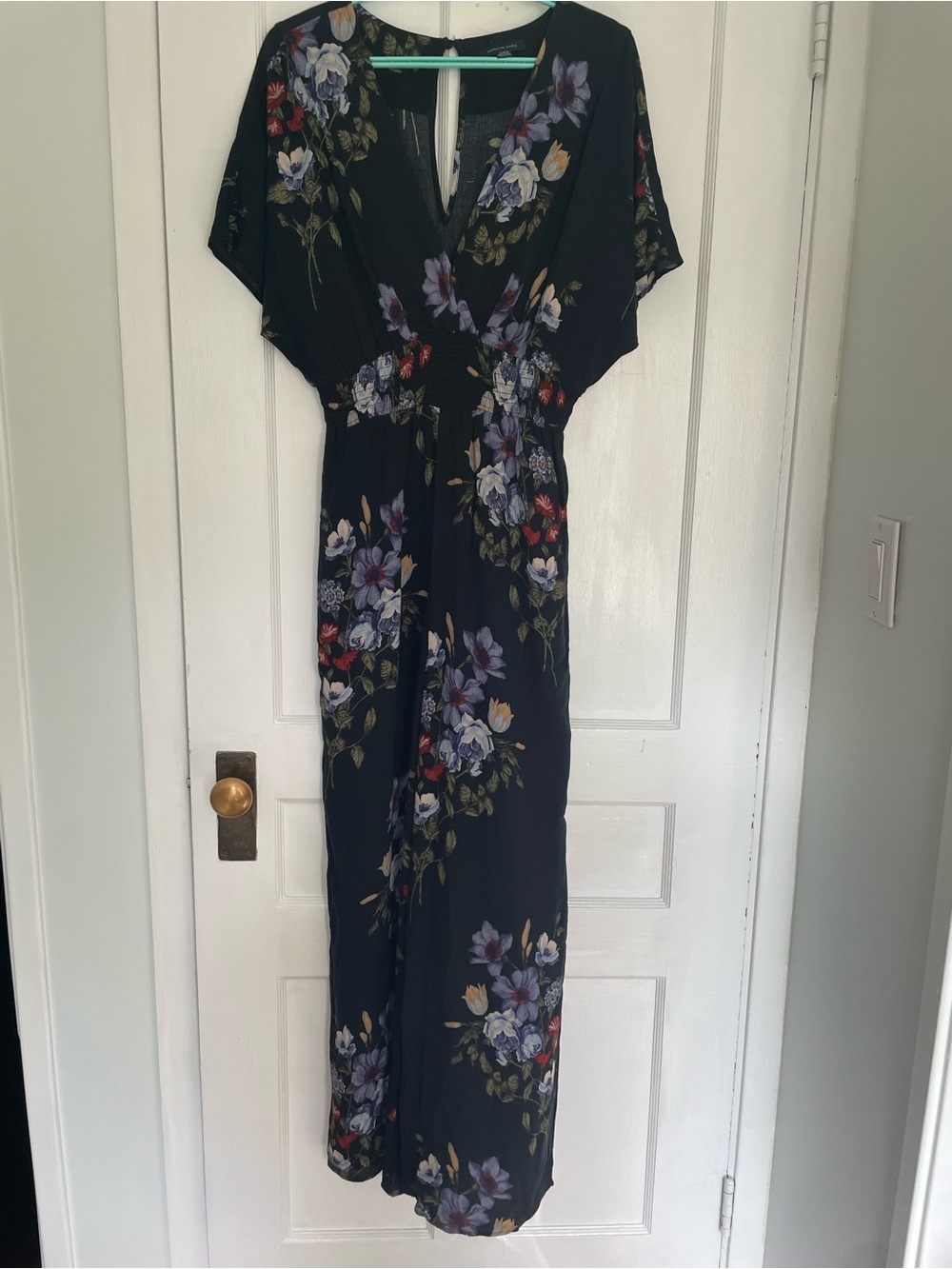 American Eagle Black Floral Jumpsuit with short sleeves